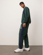 Wimbledon capsule chest panel v-neck knit jumper and tennis track pants co-ord in dark green
