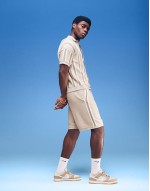 Comfortable relaxed textured stripe polo and shorts co-ord in beige
