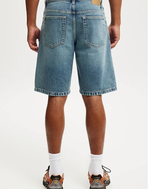 slim regular length denim short in light wash blue