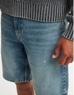 slim regular length denim short in light wash blue