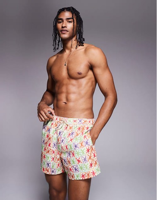 swim shorts in mid length with cargo pockets in dark brown