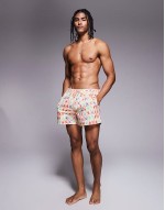 swim shorts in mid length with cargo pockets in dark brown