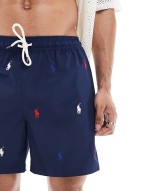 Traveler icon logo slim fit mid swim shorts in beige