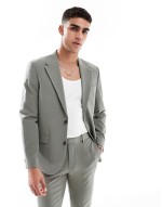Comfortable four way stretch skinny suit in dark green